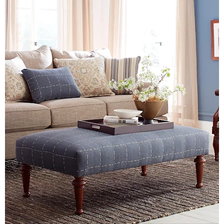 Transitional Cocktail Ottoman with Tall Turned Legs